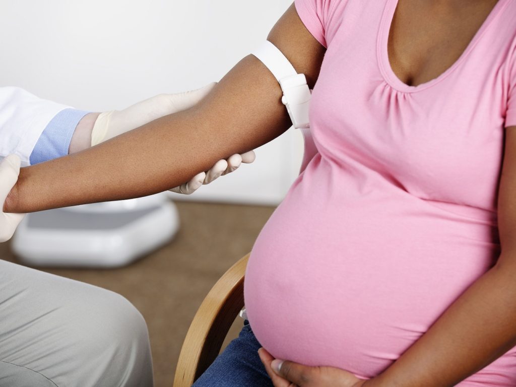 Pregnant woman attending antenatal visit